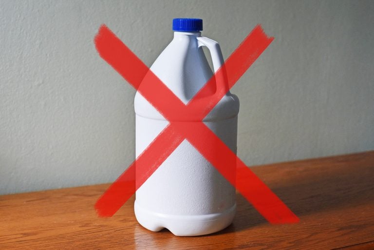 bleach bottle with a red stop symbol indicating do not use bleach