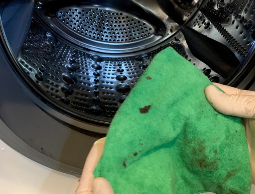 Washing Machine Smells bad with bacteria and debris on cleaning cloth Healthy Home Solutions