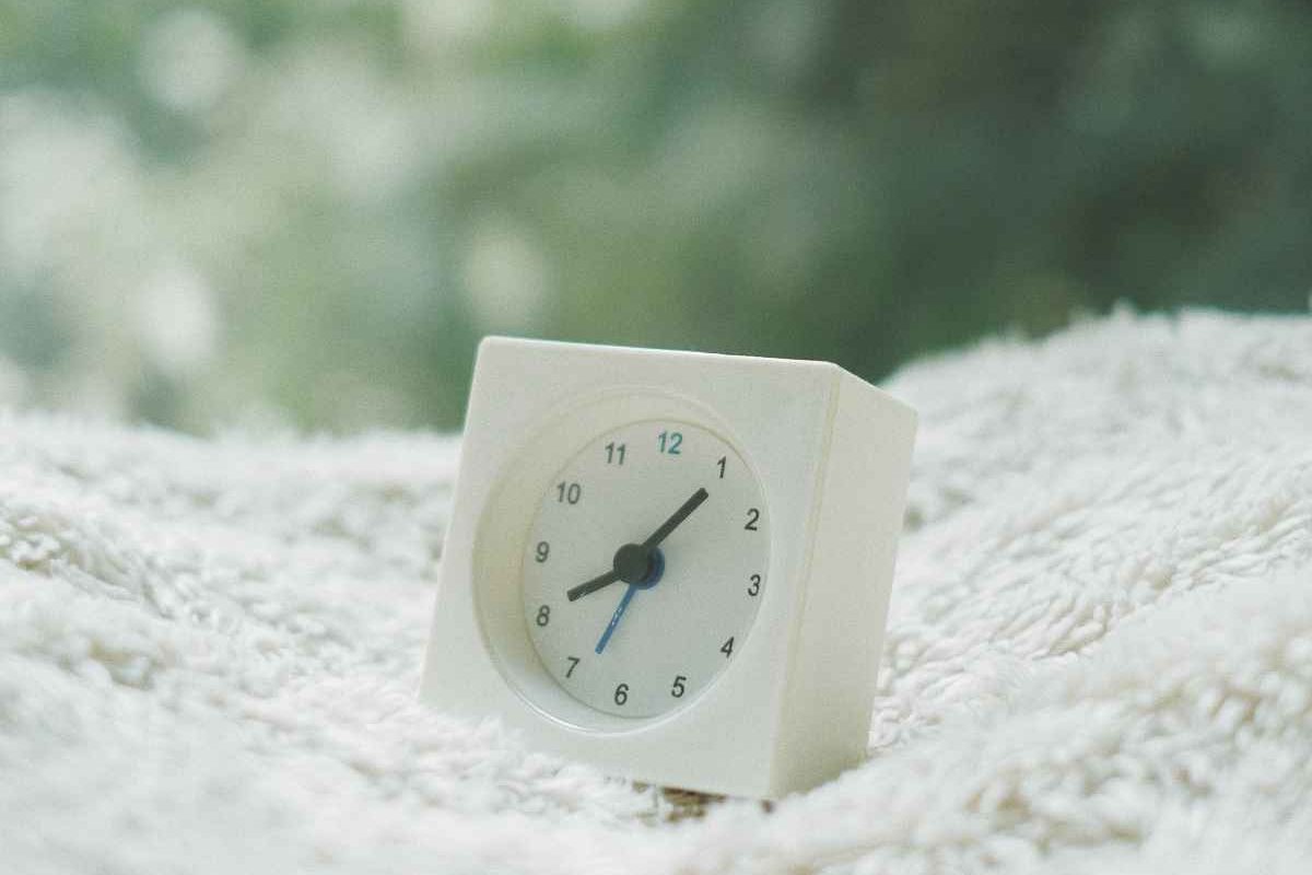 alarm clock on laundry indicates dryer taking too long